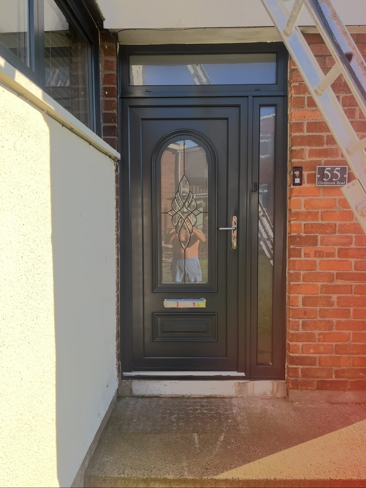 PVC door resprayed black in Newtownards